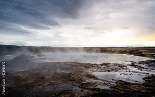 Impressive view of Icelands Geysir Geisir in the Golden Circule, the geothermal activity and a attraction for tourists in Iceland