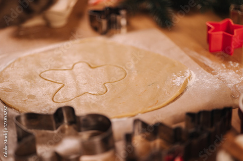 Making gingerbread at home. Cutting cookies of gingerbread dough