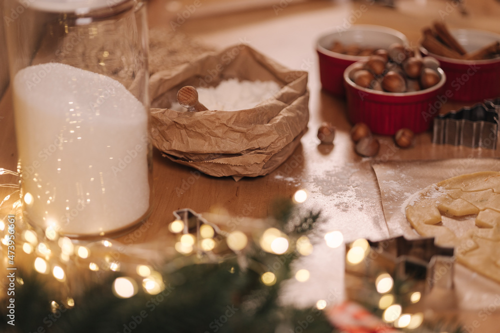 Preparing for baking at happy Christmas evening. Make some sweets at home