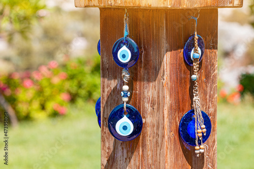 An amulet against the evil eye is a traditional decoration hanging at the entrance to the house. Superstitions and omens in Turkey photo