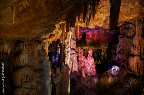 excursion with tourists to the Sfendoni cave with stalactites, stalagmites and stalagnates underground, photo