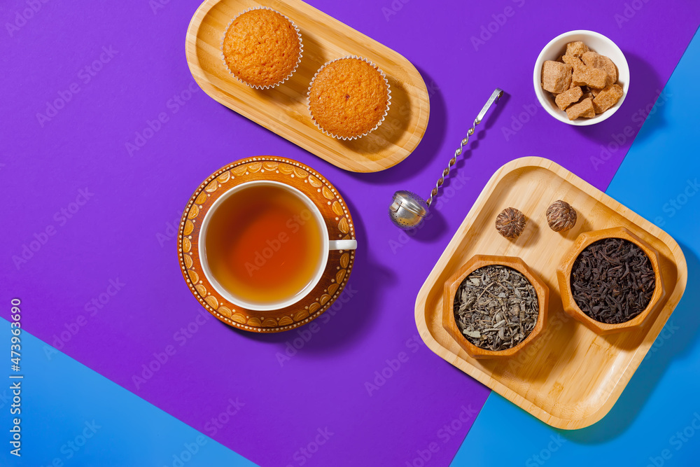 Tea with dessert on a bright colored background Tea with dessert on a bright colored background