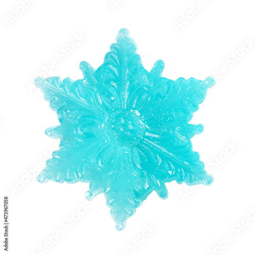 Blue candy snowflake isolated on white background.