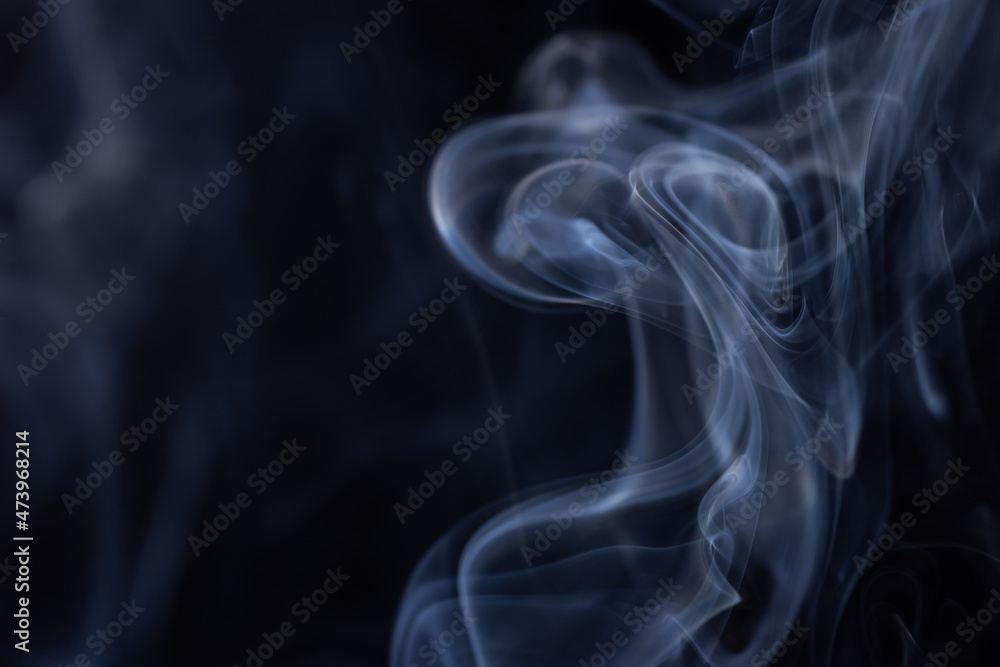 Movement of white smoke isolated on black background.. Movement of white smoke isolated on black background..
