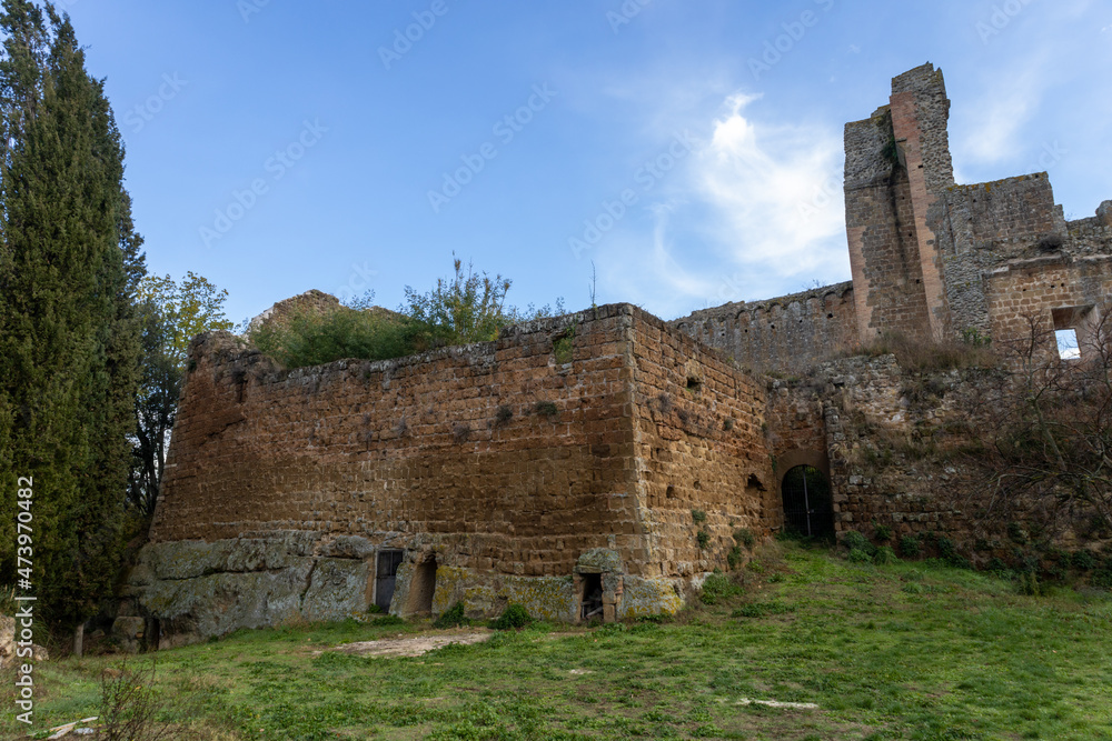 Rocca Aldobrandesca, the remains of old castle of the medieval village of Sovana founded in Etruscan times. Tuff city in Tuscany. Italy