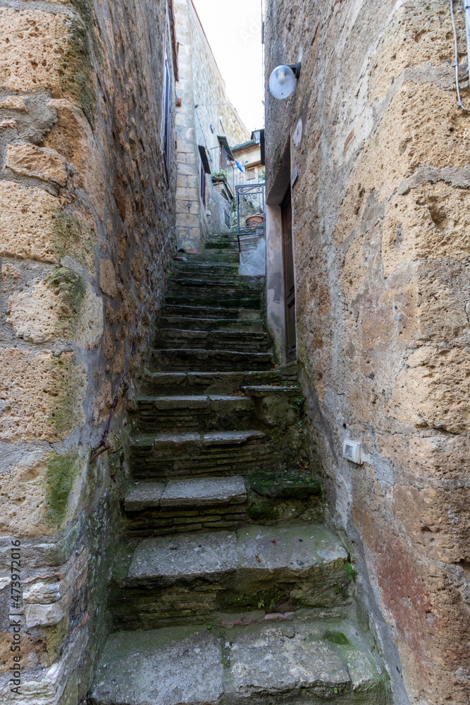 glimpse of the village of Sorano a city founded in Etruscan time, Tuscany, Italy. glimpse of the village of Sorano a city founded in Etruscan time, Tuscany, Italy.