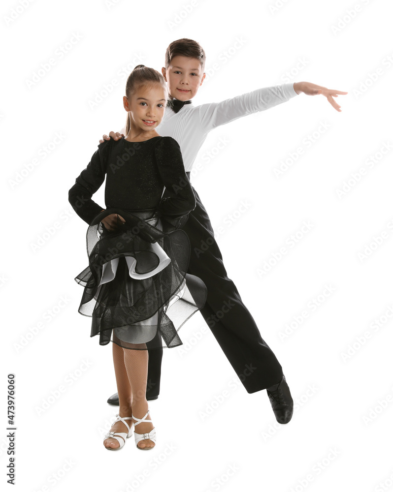 Beautifully dressed couple of kids dancing on white background Beautifully dressed couple of kids dancing on white background