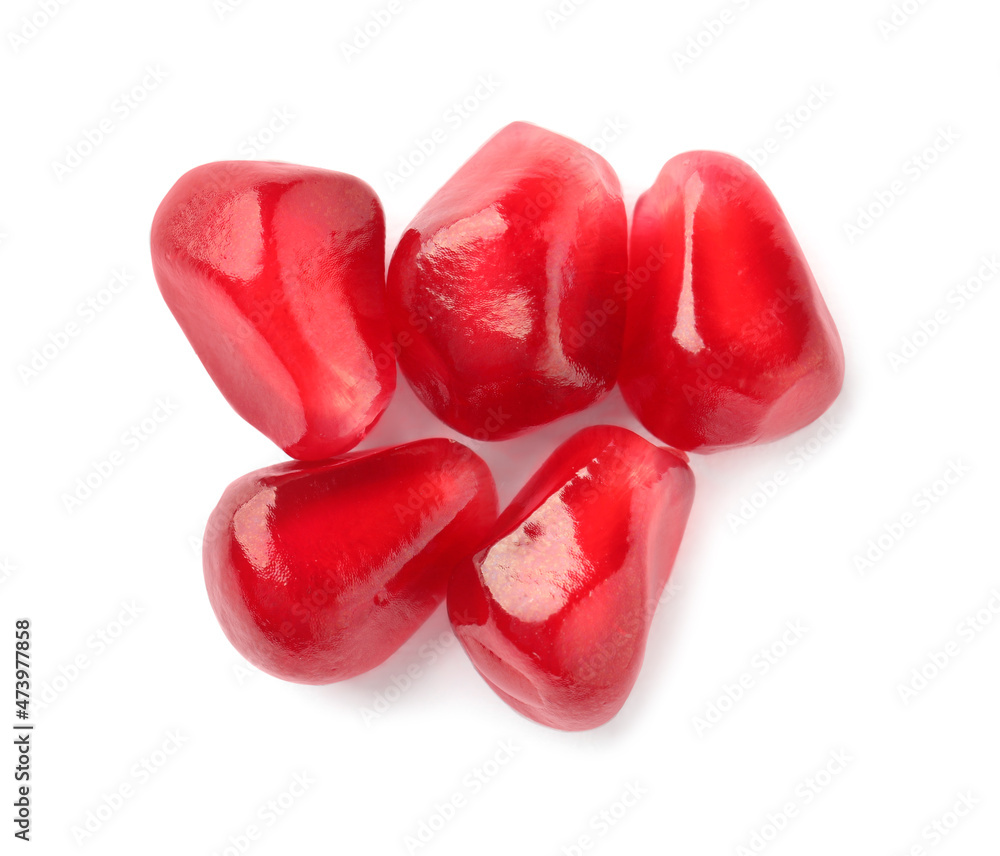 Tasty pomegranate seeds on white background, top view Tasty pomegranate seeds on white background, top view
