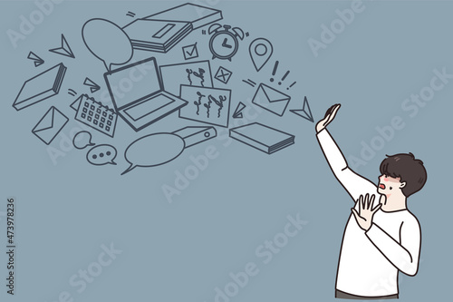 Anxious young man overwhelmed with information overload stop digital flow. Worried guy have data abundance overstock, reject notification. Virtual hygiene concept. Flat vector illustration.  photo