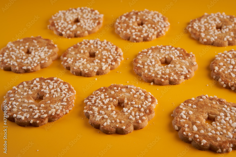 Christmas biscuits on yellow Christmas biscuits on yellow