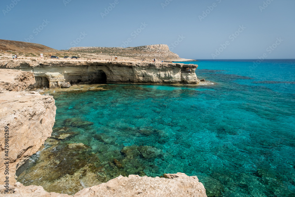 Rocky shore of Sea Caves, Cape Greko, Agia Napa, Cyprus, Europe. Summer landscape at sea.