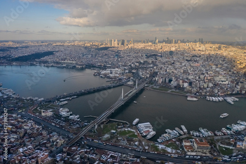 Turkey, Istanbul, Aerial view of Ataturk and Golden Horn Metro bridges at dusk photo