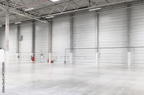 Clean and empty industrial hall in detail for supporting poles