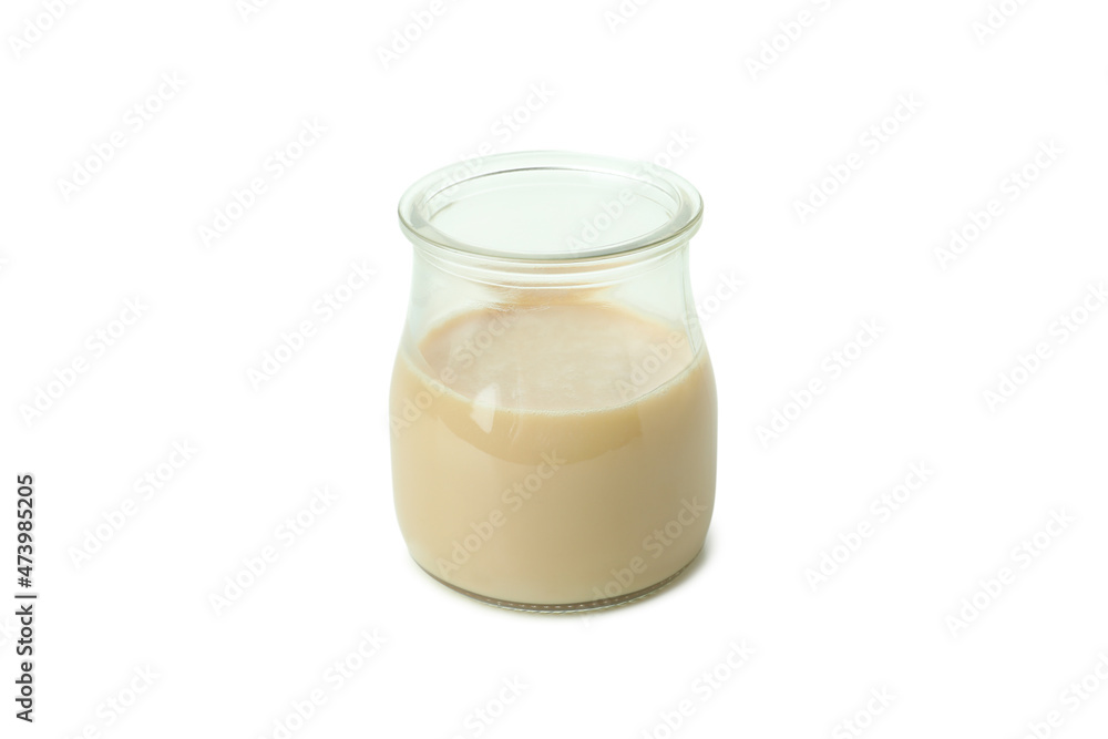 Tahini sauce in a jar isolated on white background Tahini sauce in a jar isolated on white background