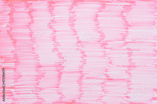 
Permanent pink marker doodles pattern texture brushes on white background. Closeup of red marker doodles on pink paper background. photo
