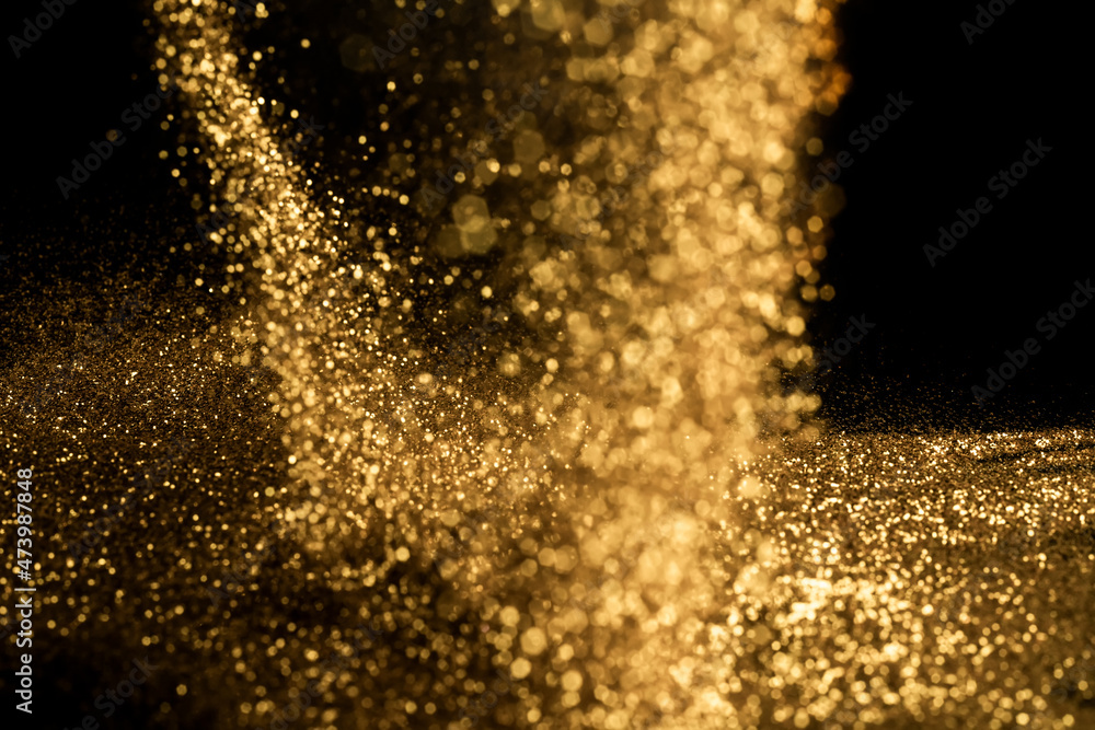 Fototapeta premium Gold particle dust for background