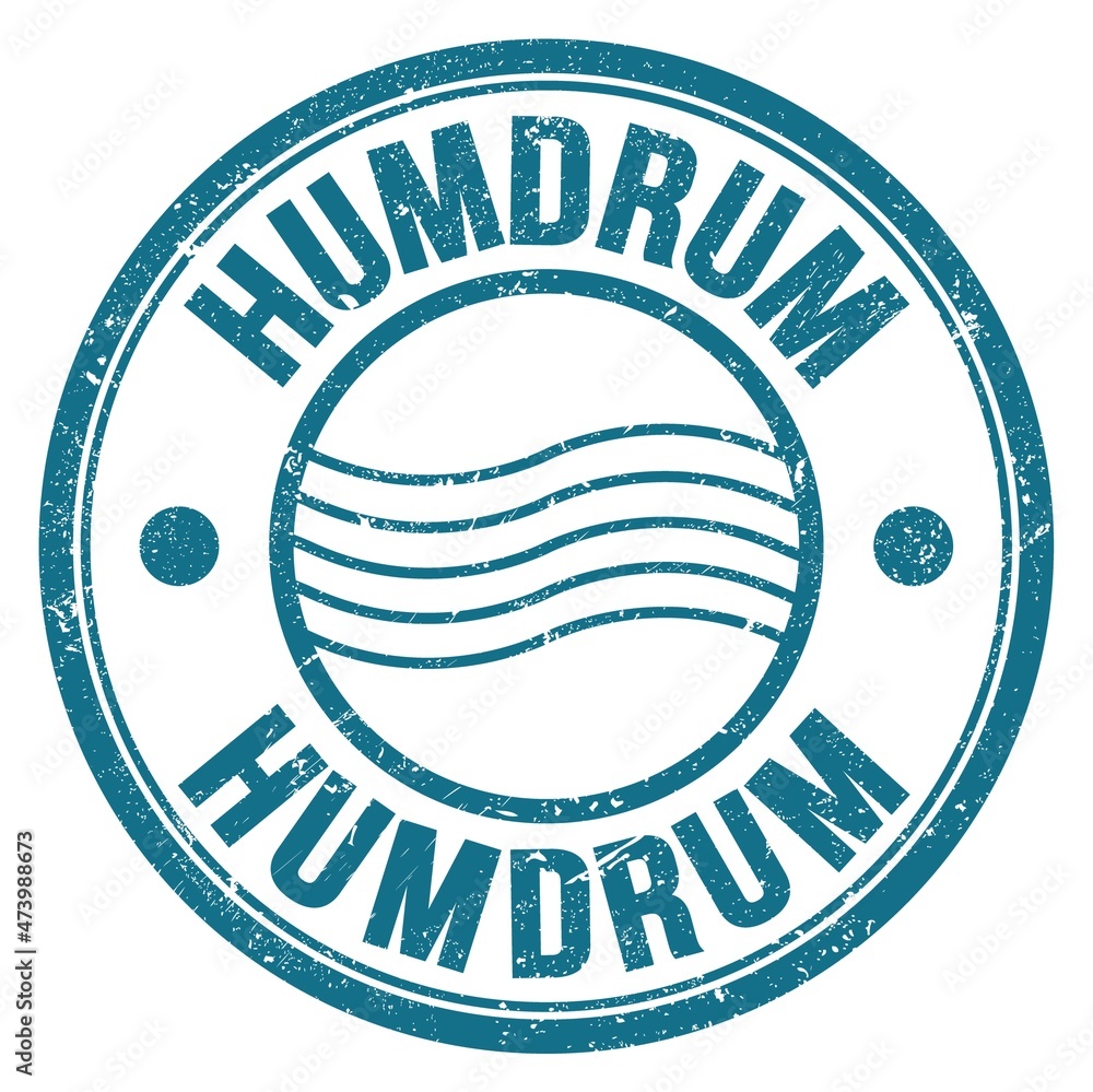 HUMDRUM text written on blue round postal stamp sign HUMDRUM text written on blue round postal stamp sign