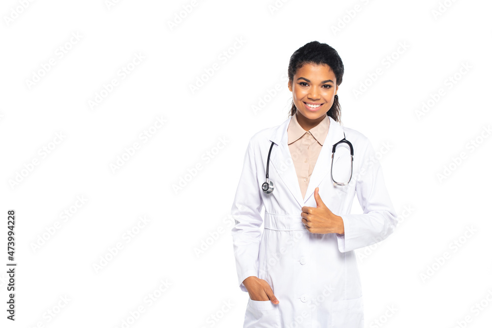 Smiling african american doctor showing like gesture isolated on white. Smiling african american doctor showing like gesture isolated on white.