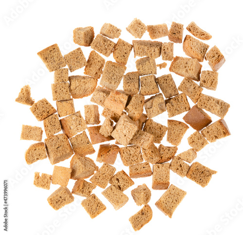 Baked crackers isolated white background close up. heap small pieces dried bread. crumbs of bread croutons