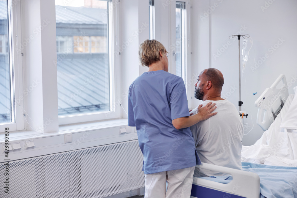 Nurse taking care of patient in hospital Nurse taking care of patient in hospital