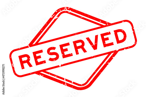 Grunge red reserved word rubber seal stamp on white background