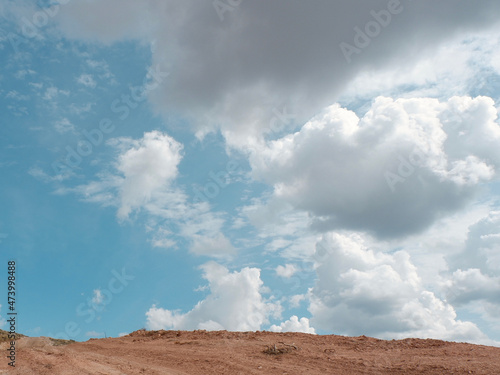 Dramatic sky with voluminous clouds. Concepts of end and beginning