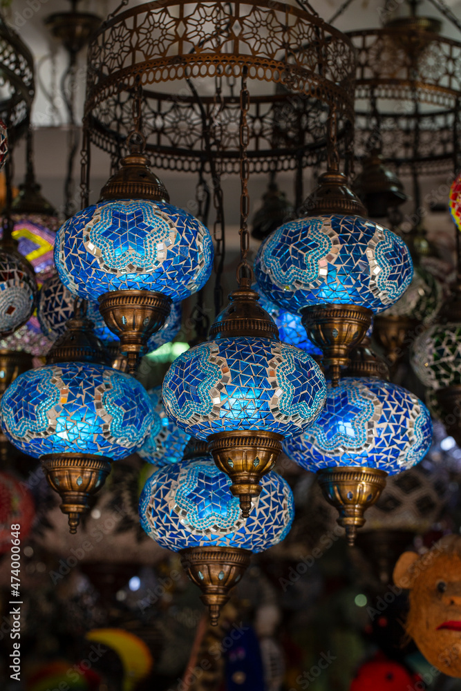 Colorful turkish mosaic glass lamps for sale at the street market in Turkey