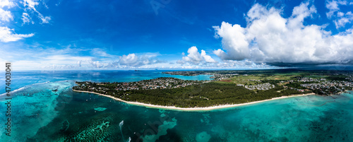 Scenic view of landscape by turquoise ocean at Trou Aux Biches, Mauritius, Africa photo