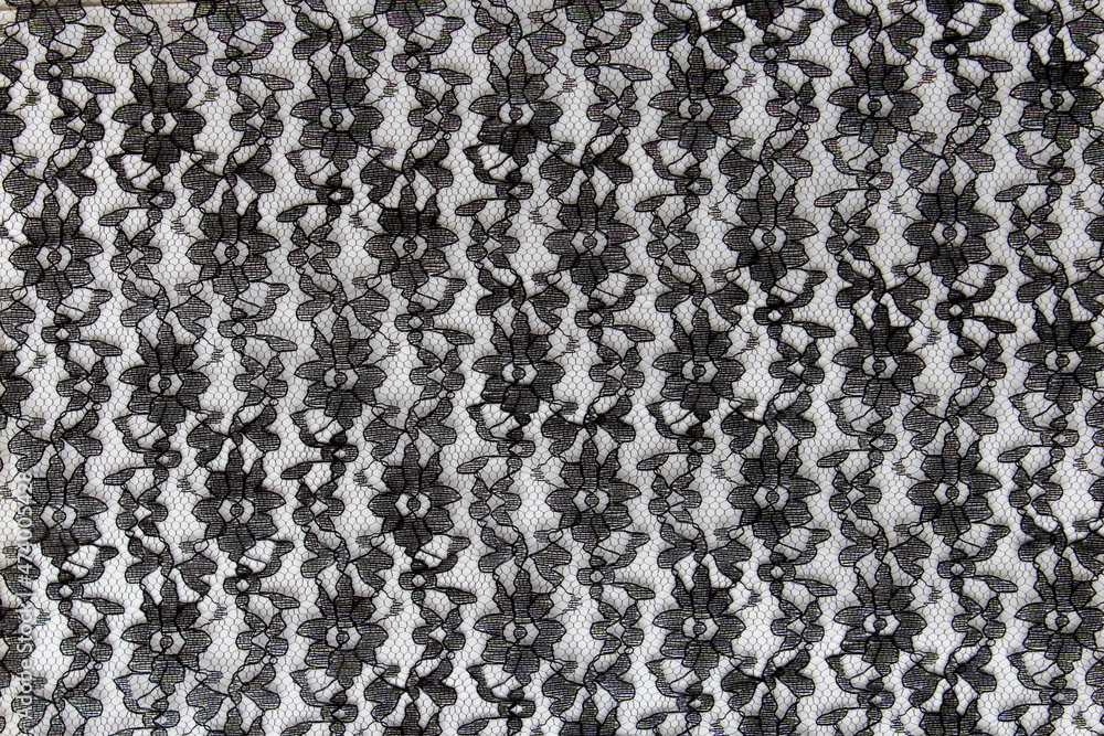 Black lace with flowers on a white background Black lace with flowers on a white background