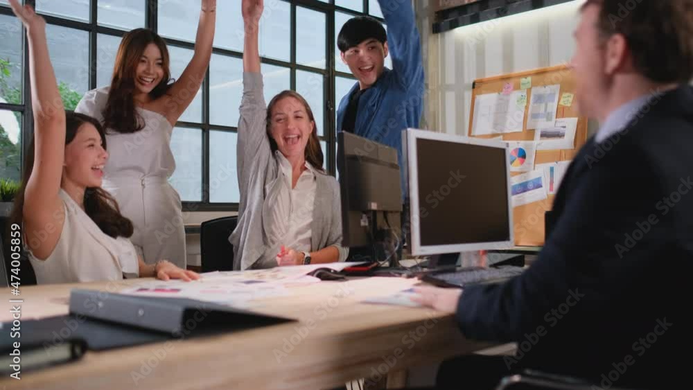 Business team action of join hands and celebrate after meeting in office for the successful of project. Business team action of join hands and celebrate after meeting in office for the successful of project.