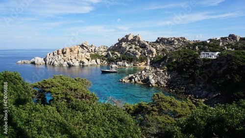 a boat next to the Spiaggia di Cala Spinosa in Santa Teresa Gallura, Sardinia, in the month of October