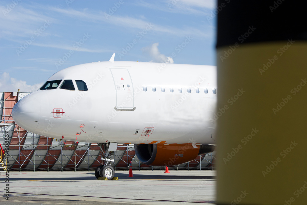 New plane waiting to be towed to the gate New plane waiting to be towed to the gate