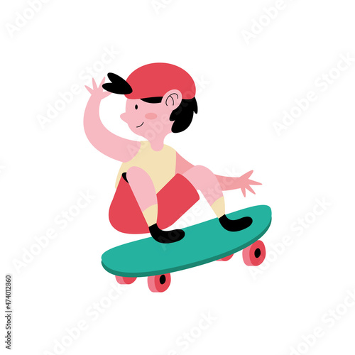 little boy practicing skateboarding