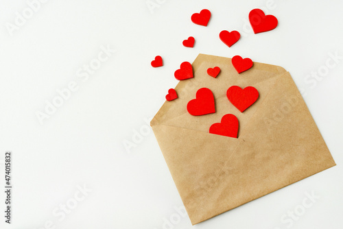 Valentine's Day. An envelope and red hearts. 14 February. Valentines day greeting card, copy space