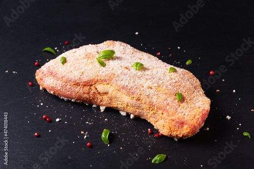Valokuva Food concept uncooked Veal cordon bleu on black slate stone board with copy spac