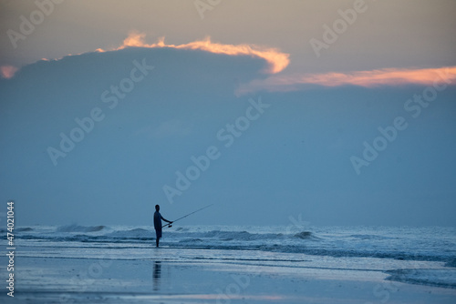 Sunrise surf fisherman on Hilton Head Island, South Carolina