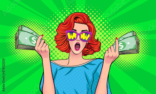 success woman surprised WOW in sunglasses and show lot of money in hands