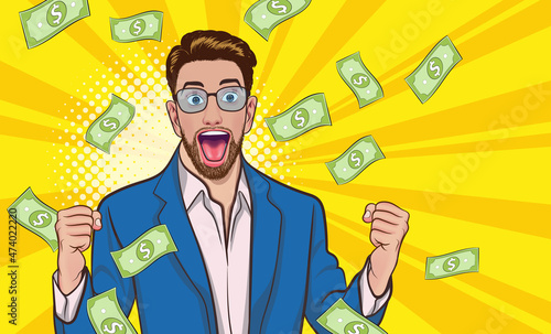 surprised young business man in glasses hands up fist  with Falling Down Money