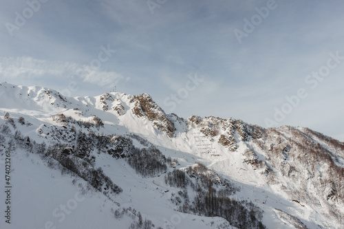 Wallpaper Mural Alpine landscape, slopes of high mountains with glaciers against the blue sky. Torontodigital.ca