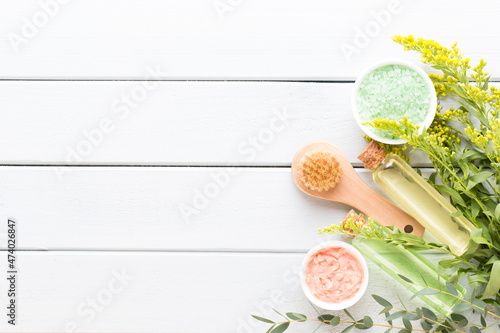 Beauty and homemade cosmetic, concept with spa set on pastel rustic wooden background.