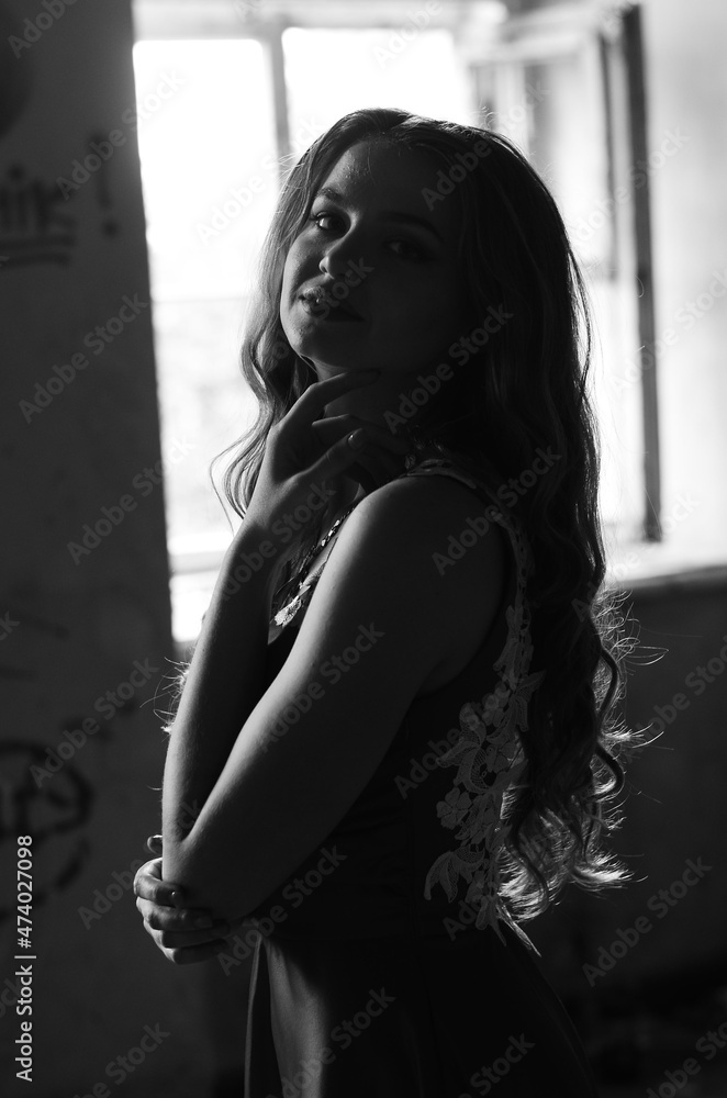 Young sensual & beauty blonde woman pose on wooden background. Black-white photo Young sensual & beauty blonde woman pose on wooden background. Black-white photo