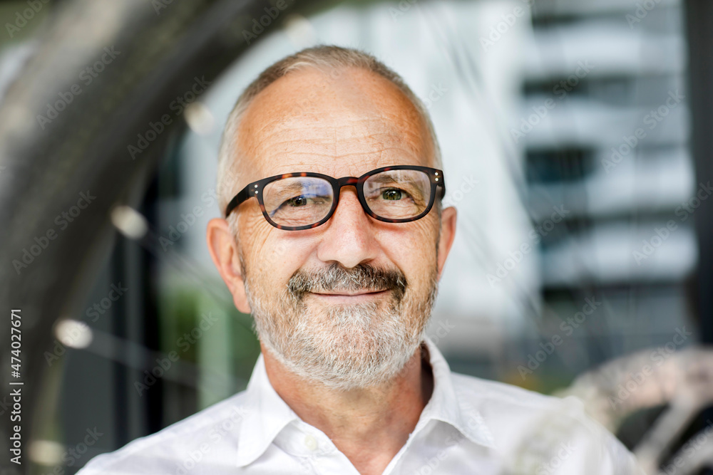Smiling businessman wearing eyeglasses Smiling businessman wearing eyeglasses