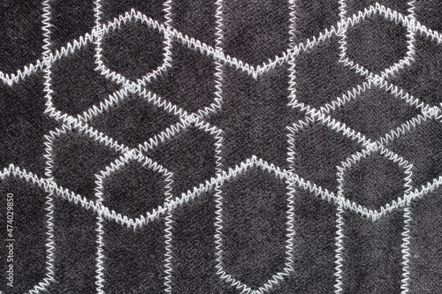 texture of black and white jacquard fabric with geometric pattern