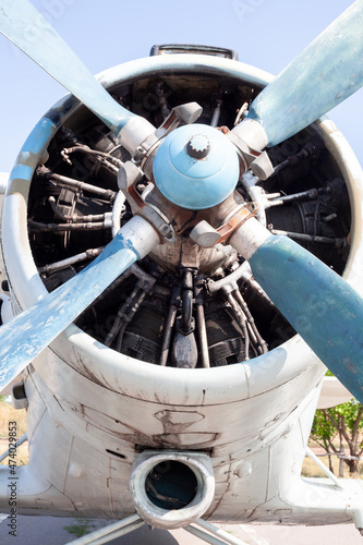 Old airplane engine close up. Radial engine of an propeller aircraft. Propellers on the nose of the aircraft.