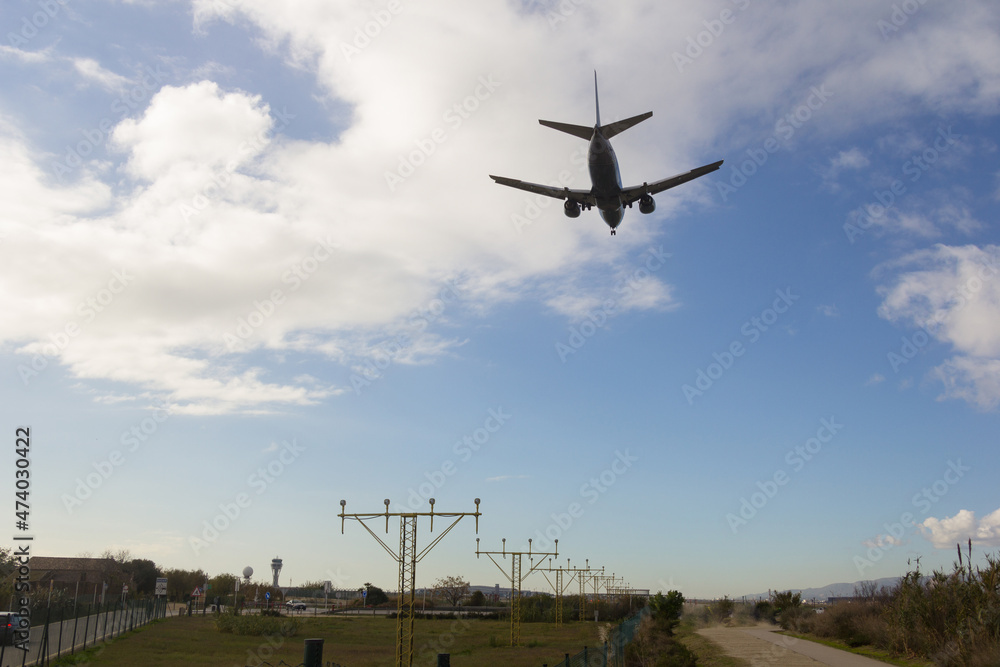 Fototapeta premium Passenger aircraft on approach to the airport for landing