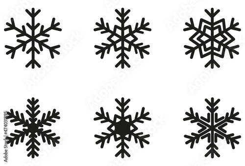 Zestaw płatków śniegu o różnych kształtach.