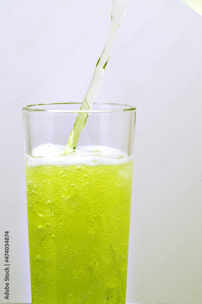 Glass with a fruit drink. Glass with a fruit drink.