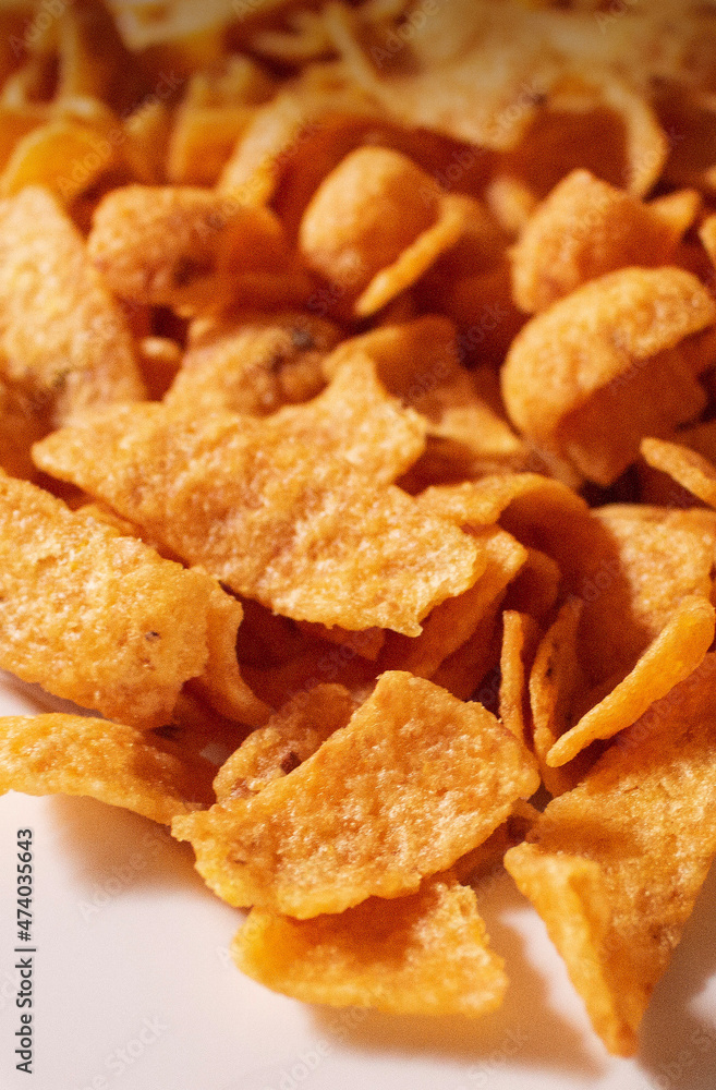 vertical perspective view of corn chips snack junk food background vertical perspective view of corn chips snack junk food background