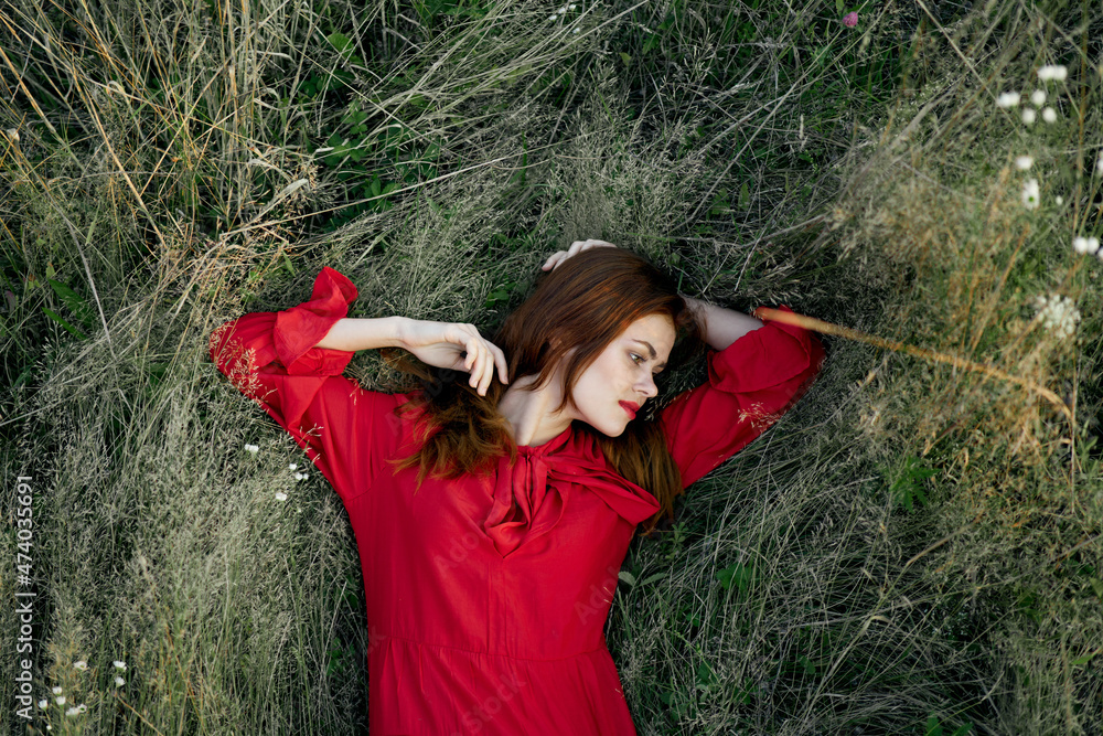 woman in red dress nature green grass landscape rest woman in red dress nature green grass landscape rest