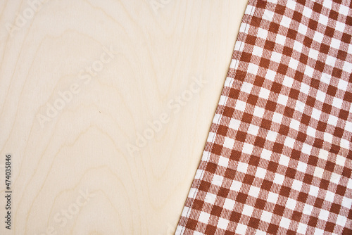 checkered tablecloth light wooden table kitchen interior